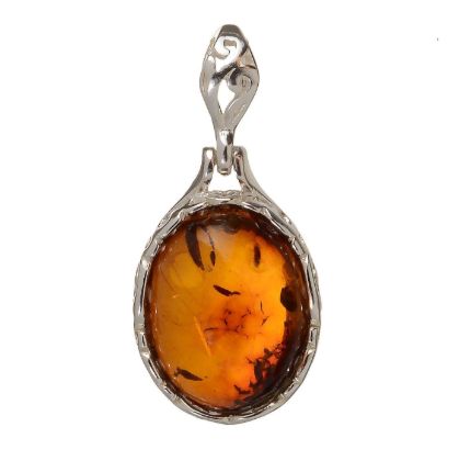 Genuine Baltic honey amber oval pendant in 925 sterling silver with natural fossil inclusions, handcrafted European amber jewelry with polished silver bail on white background