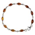 "GIA certified Baltic honey amber link bracelet in 925 sterling silver with cabochon stones and lobster clasp on white background" bracelet