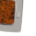 Close-up of 925 sterling silver hallmark on genuine Baltic amber pendant, authentic silver stamp detail