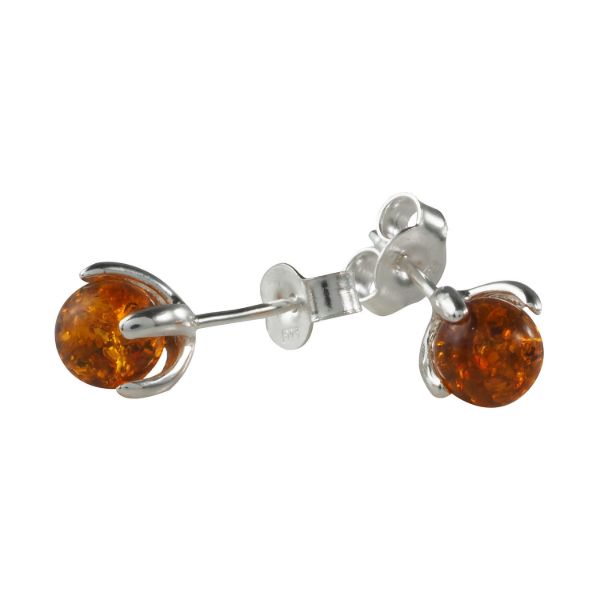 Sadie genuine Baltic honey amber stud earrings in 925 sterling silver with petal-style prong setting and post back closure, handmade Polish amber jewelry for women on white background