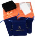 Jewelry gift packaging including velvet pouches, gift boxes, and presentation box from Holiday Gift Shops