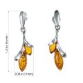 Alicia genuine Baltic honey amber earrings in 925 sterling silver with marquise cabochons, size shown 1.2 in (30 mm) long and 0.34 in (9 mm) wide, post back closure.