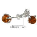 Sadie genuine Baltic honey amber stud earrings in 925 sterling silver showing 0.45 inch post length with secure butterfly back, handmade Polish amber jewelry close-up on white background