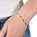 amber and silver bracelet on hand