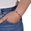 Model wearing Gemma GIA certified Baltic honey amber bracelet in 925 sterling silver, oval amber link bracelet styled on wrist with casual outfit
