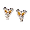 Back view of genuine Baltic honey amber butterfly stud earrings in 925 sterling silver showing secure post back and polished silver setting on white background