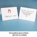 Decorative gift message card with a pen-written note.