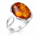 Genuine Baltic honey amber oval ring in 925 sterling silver, adjustable band, close-up