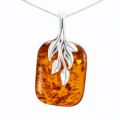 "GIA certified Baltic honey amber Fern pendant in 925 sterling silver with leaf bail and rectangular amber stone on white background"