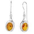 Back view of GIA certified Baltic honey amber oval earrings in 925 sterling silver French hooks with natural inclusions