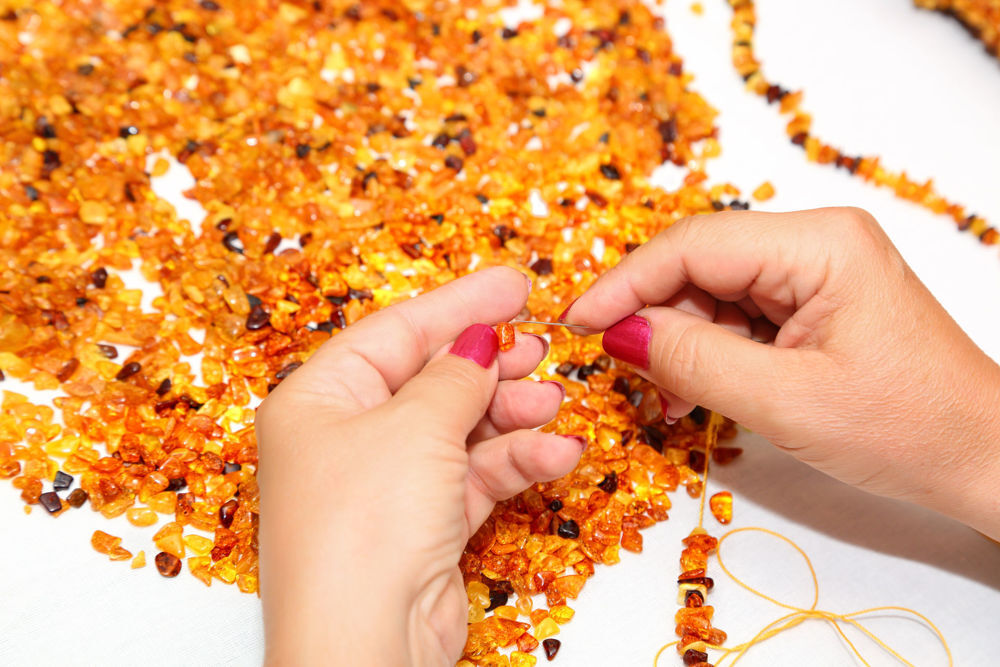 Stringing amber beads